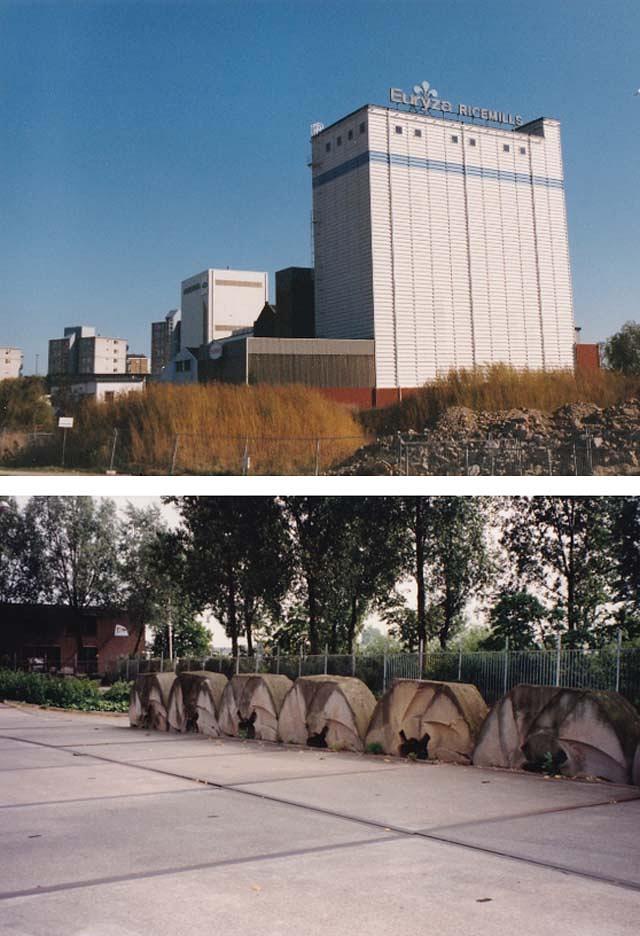 7, Molen 01519 b De Rozenburg (Zwijndrecht), De gebouwen van Euryza in 2000de molenstenen bij de ingang(Foto: N. Sonneveld) | Database Nederlandse molens